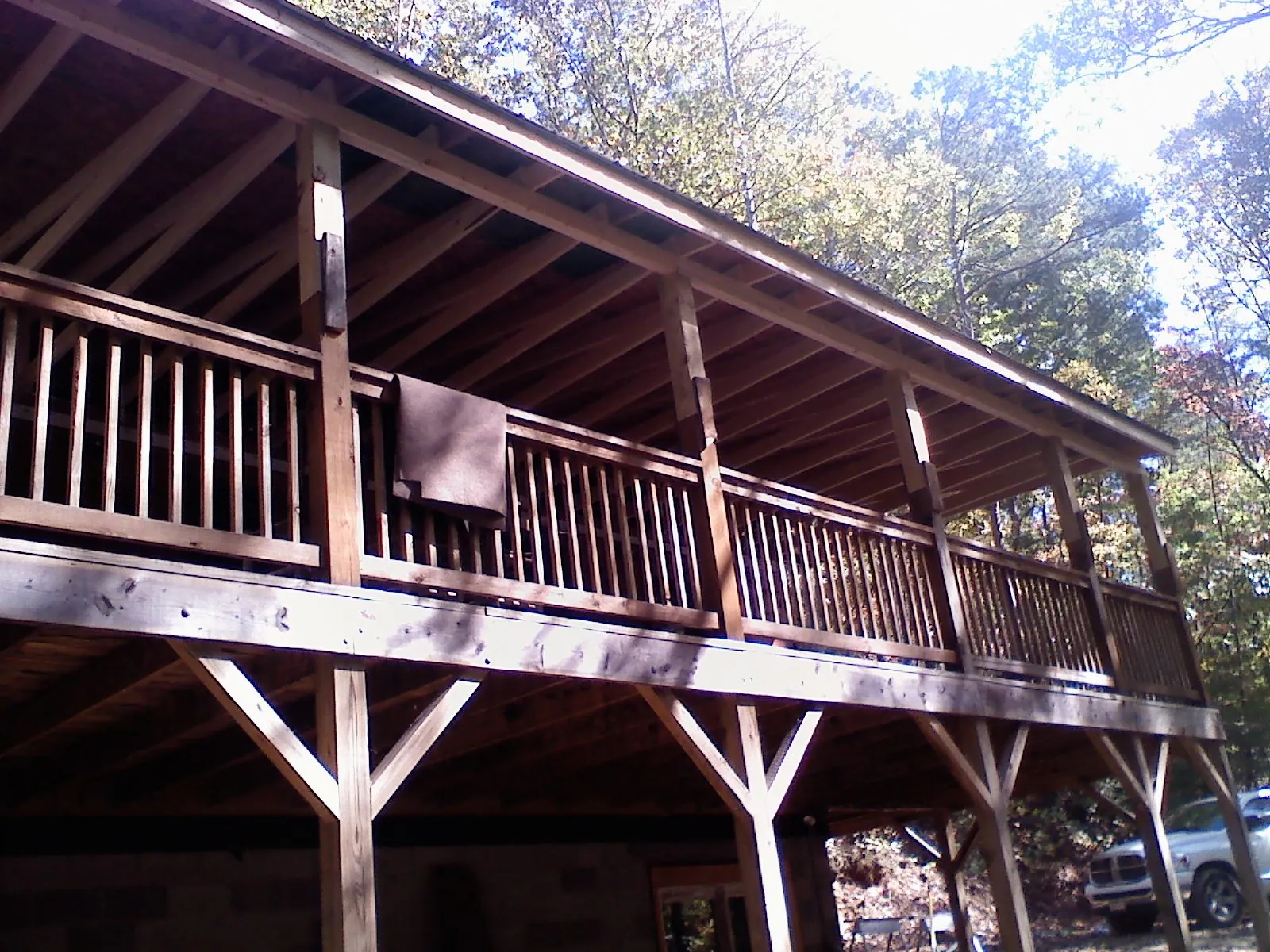 Timber framing under a new elevated porch and deck — Roof Leak Repair in Hendersonville by Roofing Brothers
